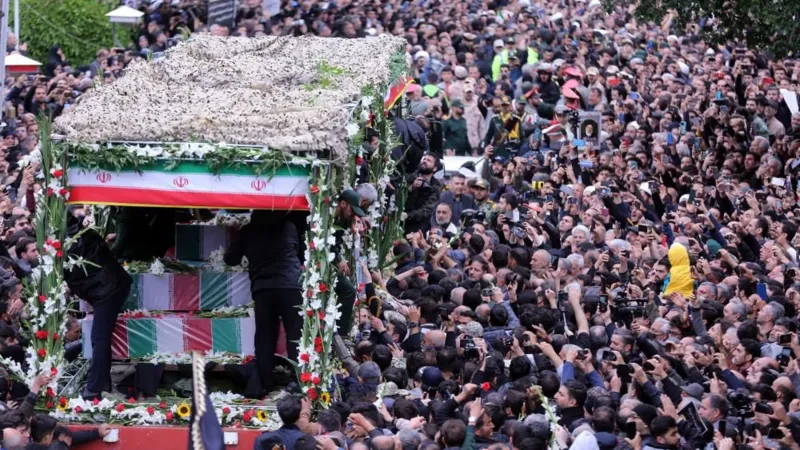Thousands Gather At Iranian Presidents Funeral Procession